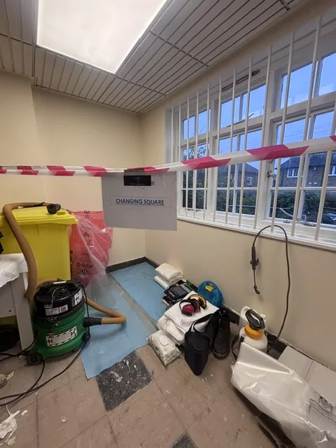 Asbestos floor tile and bitumen removal in Thamesmead